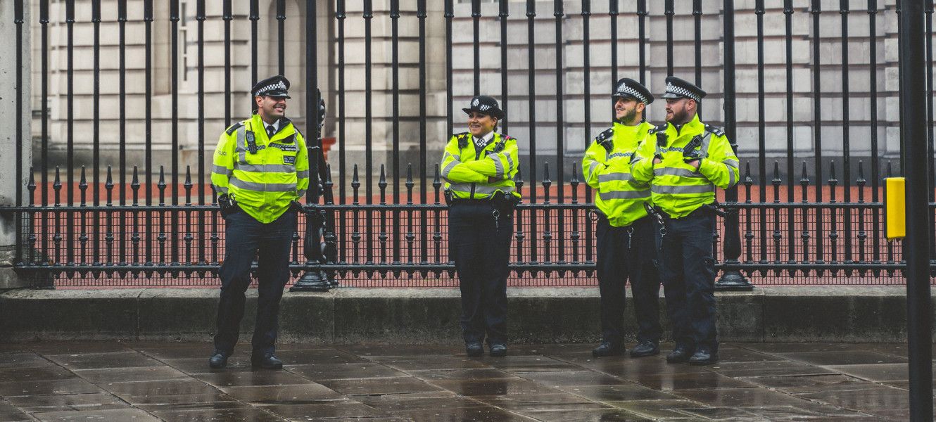 UK Police standing around Whitehall Railings
