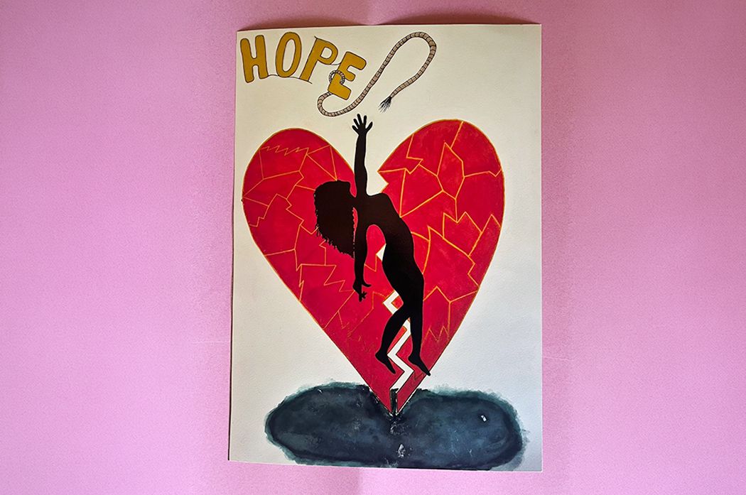 An image of a woman over a broken heart with the word Hope